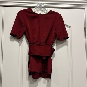 Victoria Beckham size 2 Burgundy top with a belted waist.